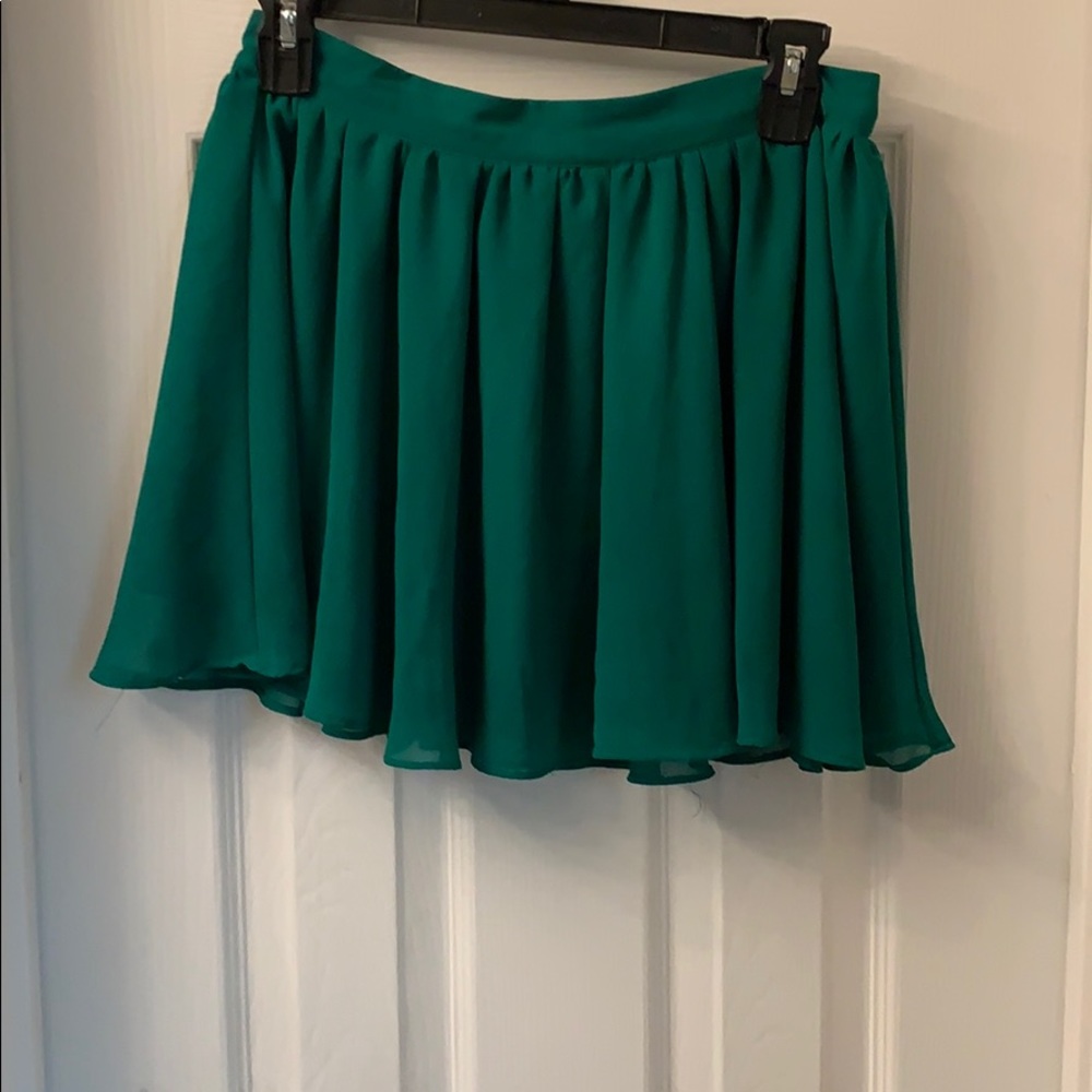 Flirty green mini skirt.